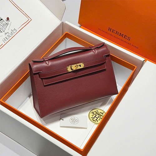 Túi cầm tay Kelly Pochette Swift Hermès - màu đỏ