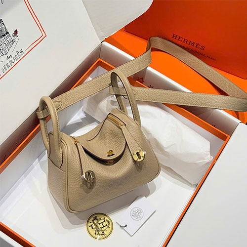 Túi xách Hermes Mini Lindy like auth – may tay 50% – màu kem nhạt